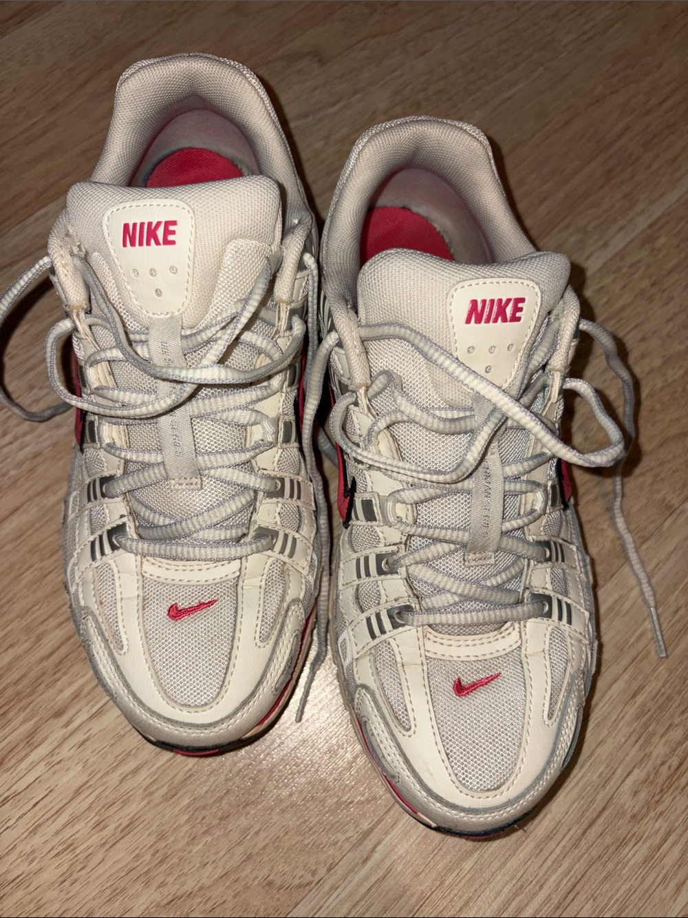 Nike Kids White Sneakers with Pink Accents